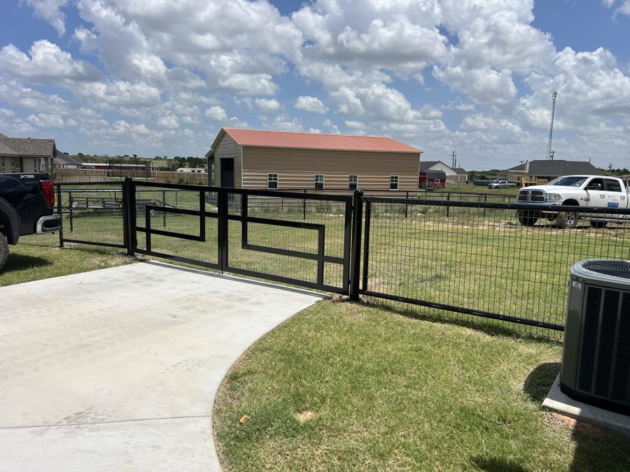 Black pipe driveway gate DFW Texas